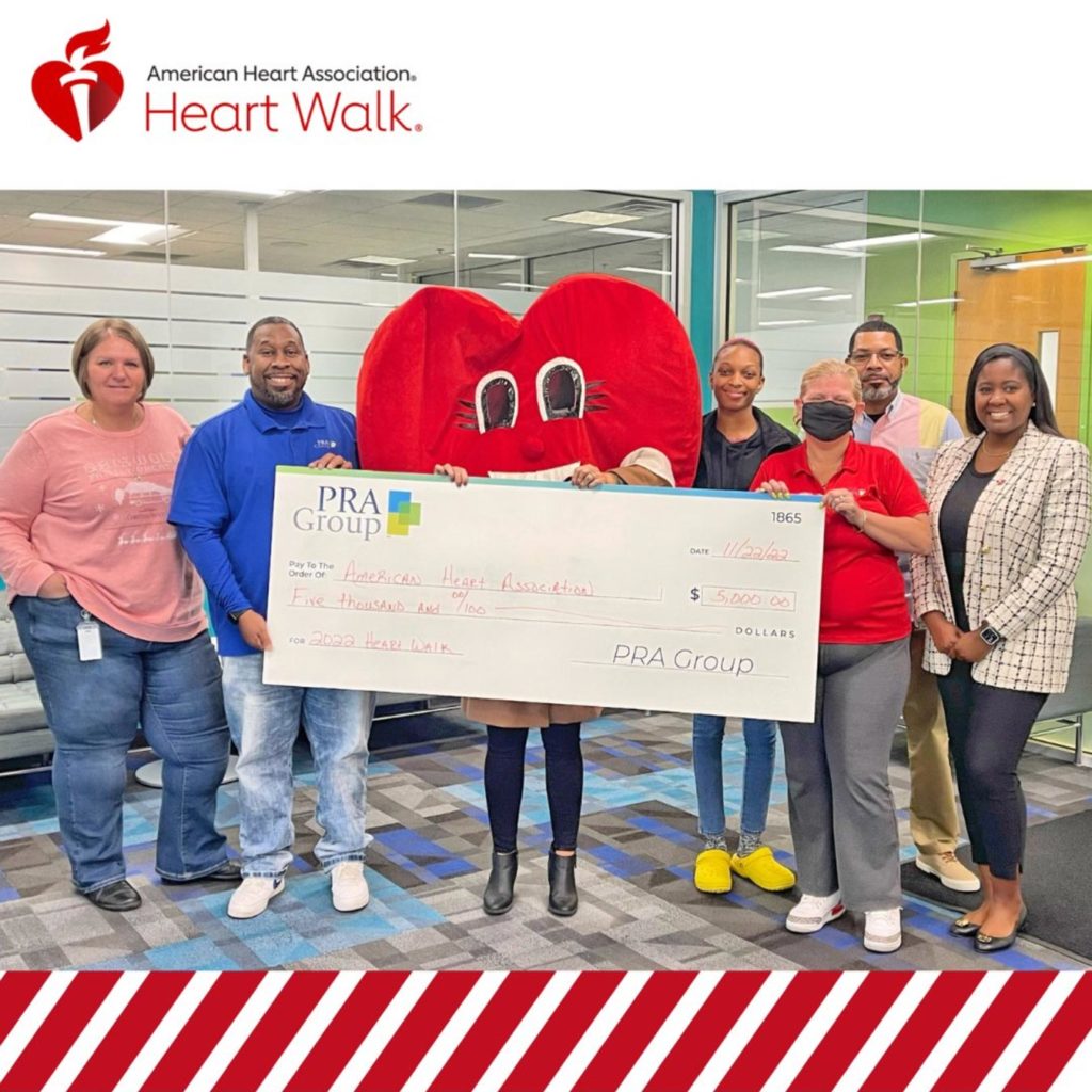 PRA Group Hampton Office presents American Heart Association with $5,000 check.