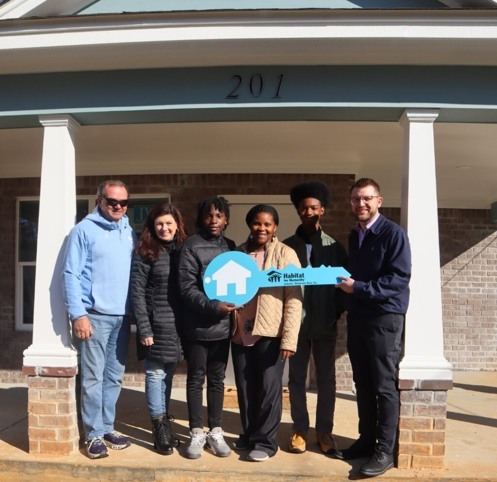 Employees Celebrate Completion of Sponsored Home Build in Tennessee
